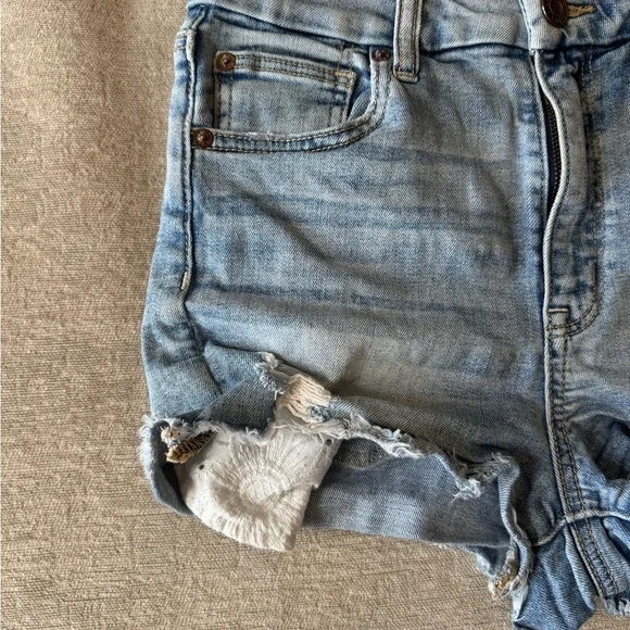 American Eagle women’s  stretch curvy high-rise Shorty distressed denim shorts - Picture 3 of 12